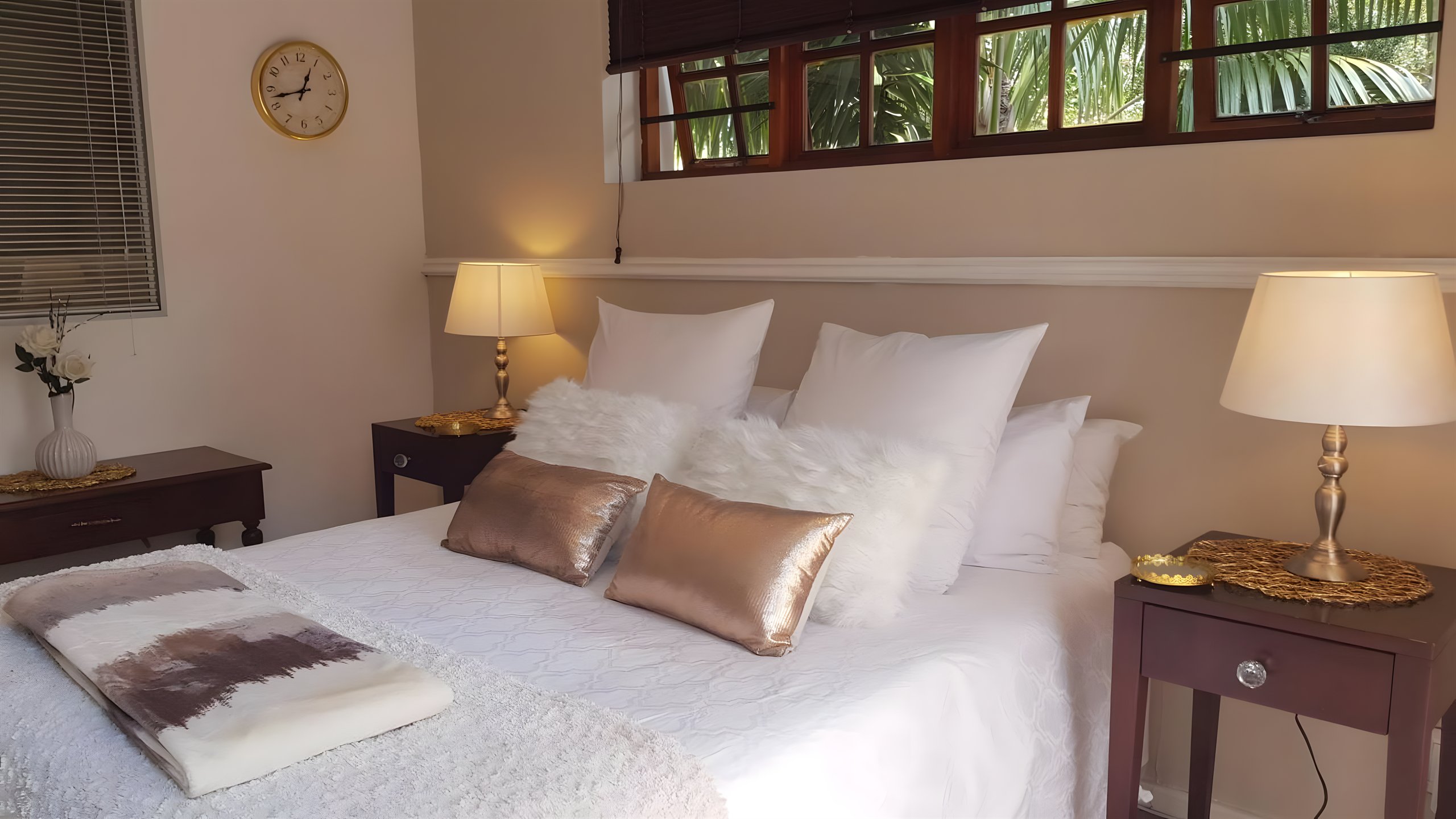 A warm, comfortably furnished bedroom at Walmer Heights