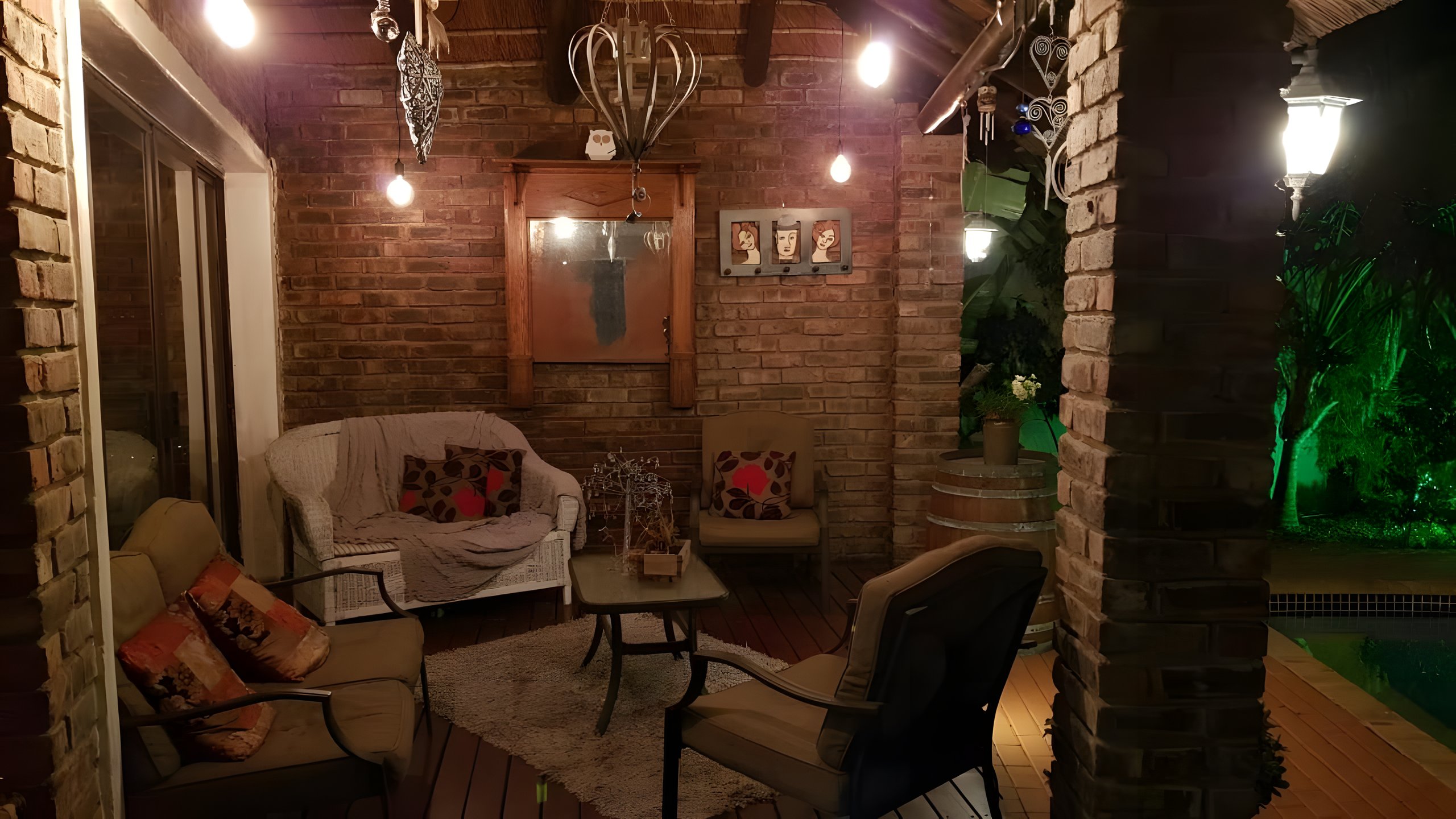 The covered patio lounge at Walmer Heights, lit at night